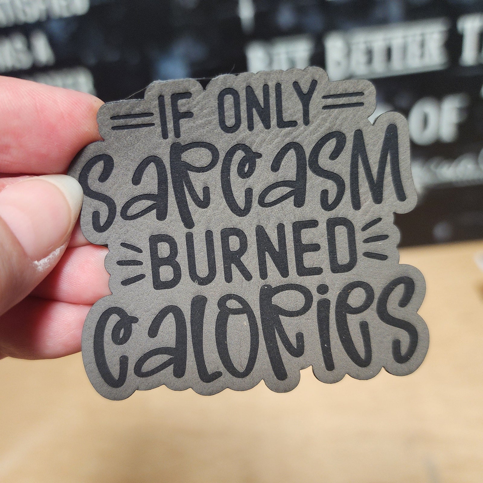 Funny leatherette hat patch with the quote 'If only sarcasm burned calories' for humor lovers.