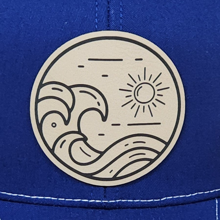 Ocean waves and sun leatherette hat patch, perfect for beach lovers and summer adventures.