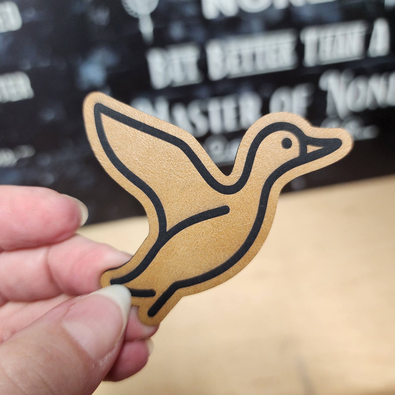 Leatherette duck hat patch for outdoor enthusiasts, ideal for caps and bags, perfect gift for bird lovers.