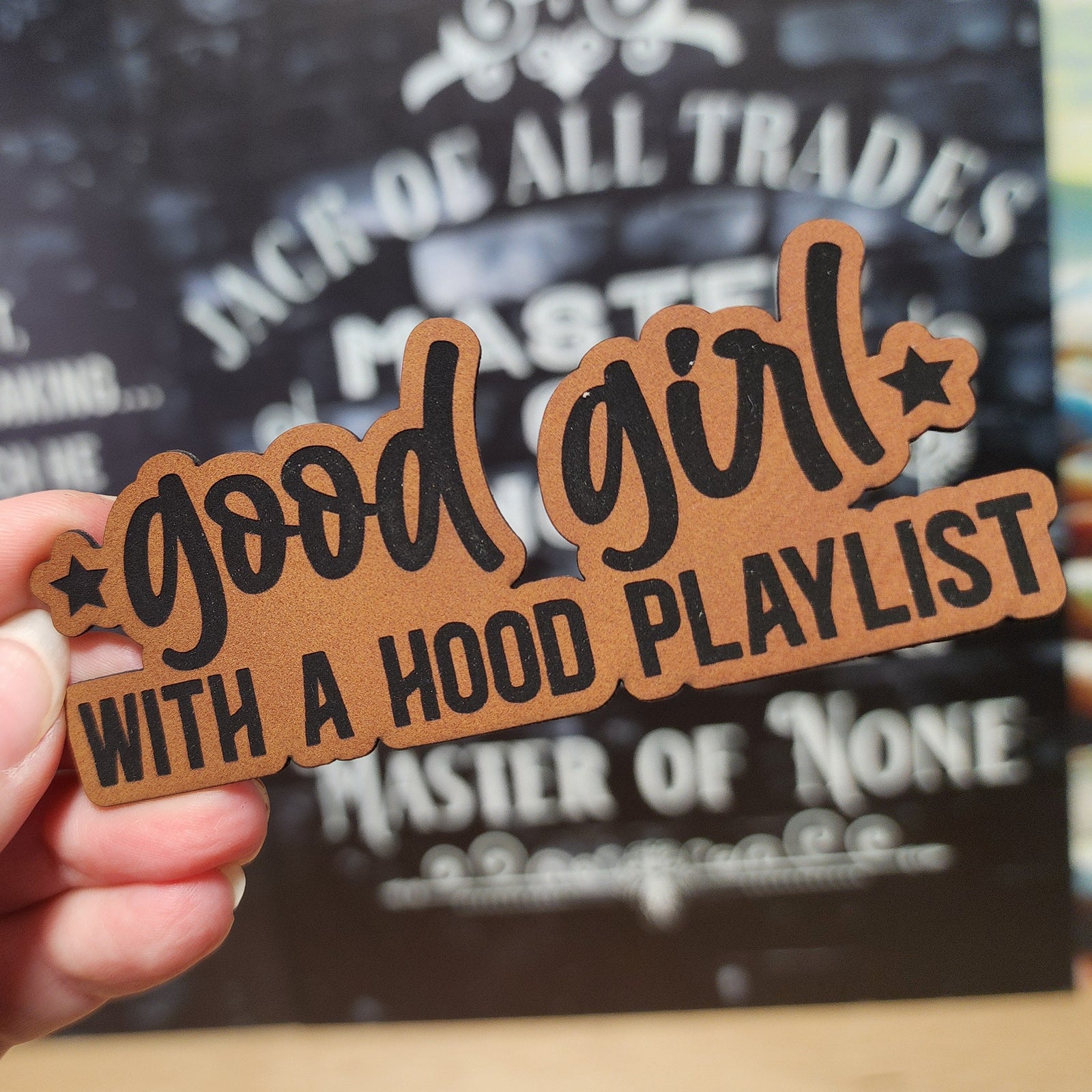 Good Girl with a Hood Playlist leatherette hat patch perfect for trendy accessory lovers and music enthusiasts.