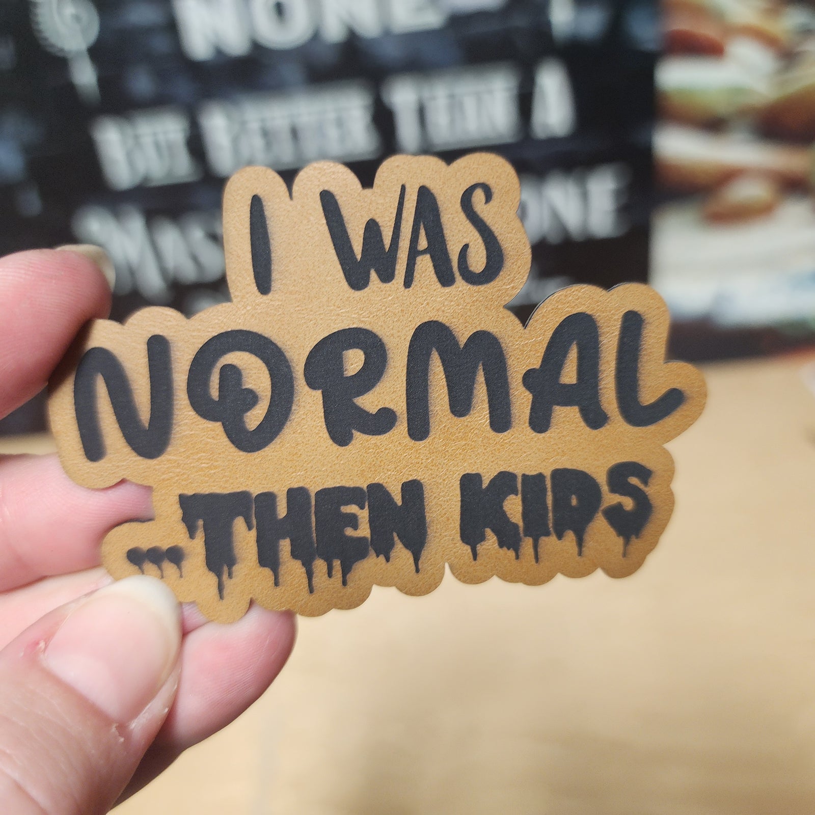 Funny leatherette hat patch saying 'I was normal... then kids' for parenting humor and gift ideas.
