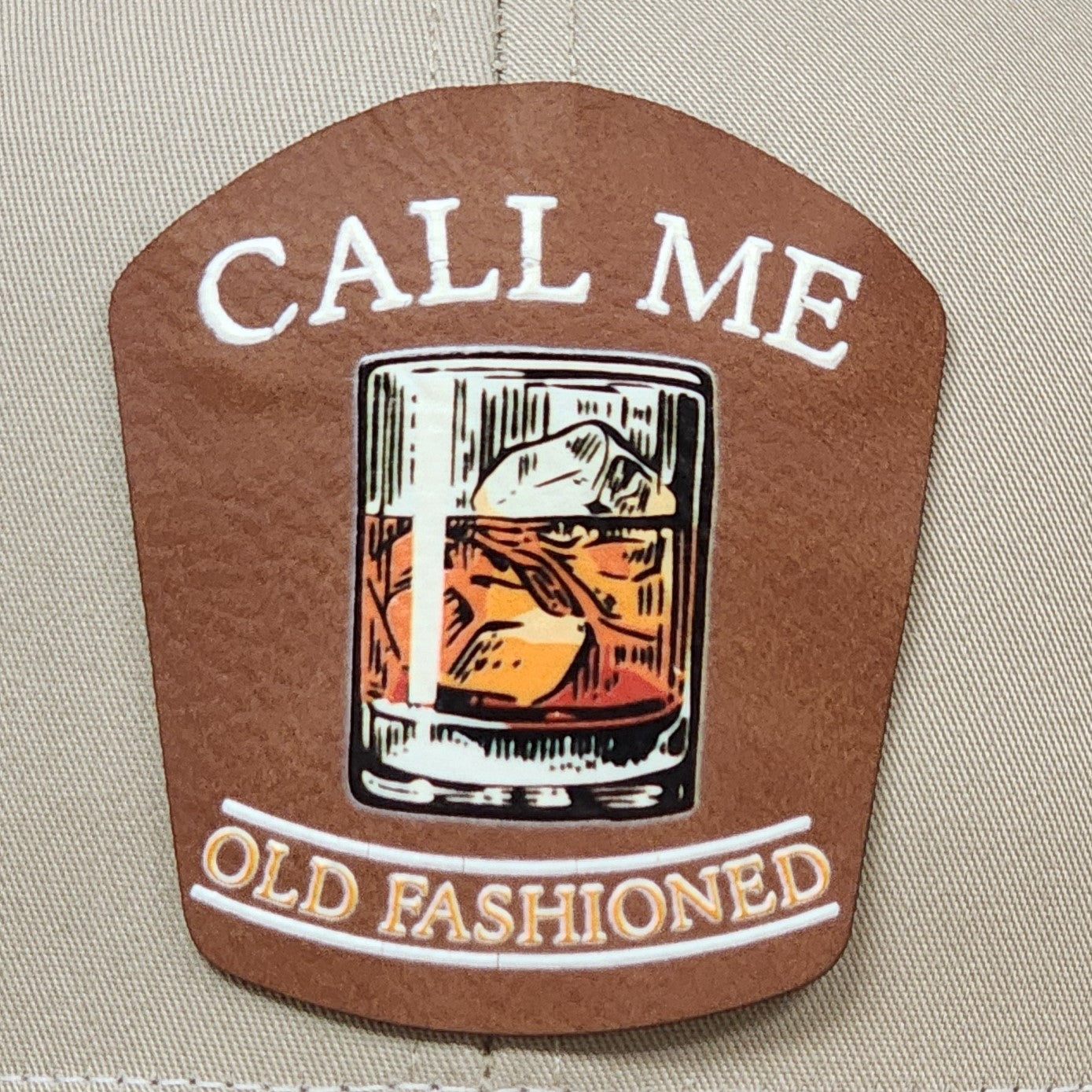 Old Fashioned leatherette hat patch featuring a classic cocktail glass design, perfect for whiskey enthusiasts.