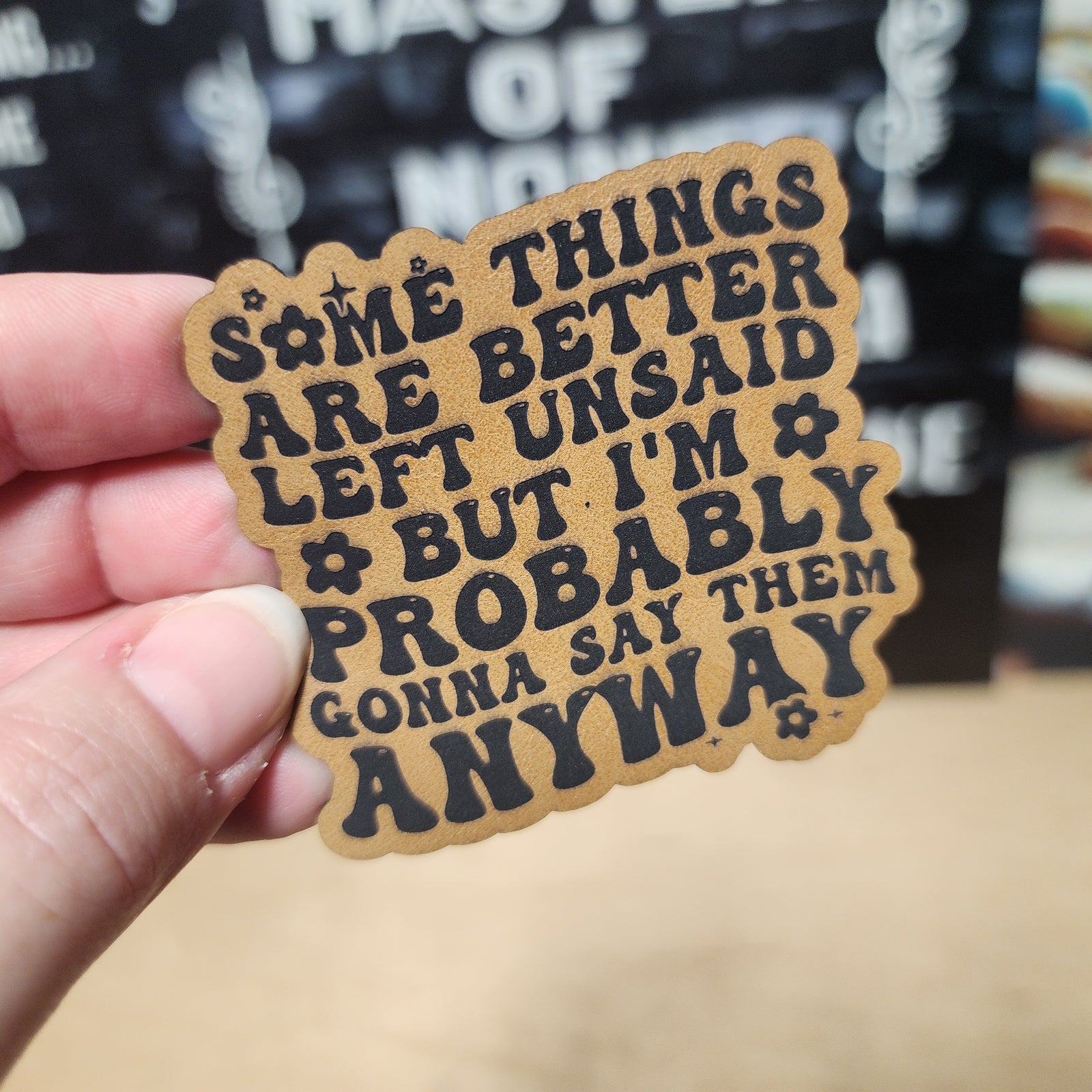 Leatherette quote patch, 'Some things are better left unsaid,' perfect for hats, bags, or creative decor.