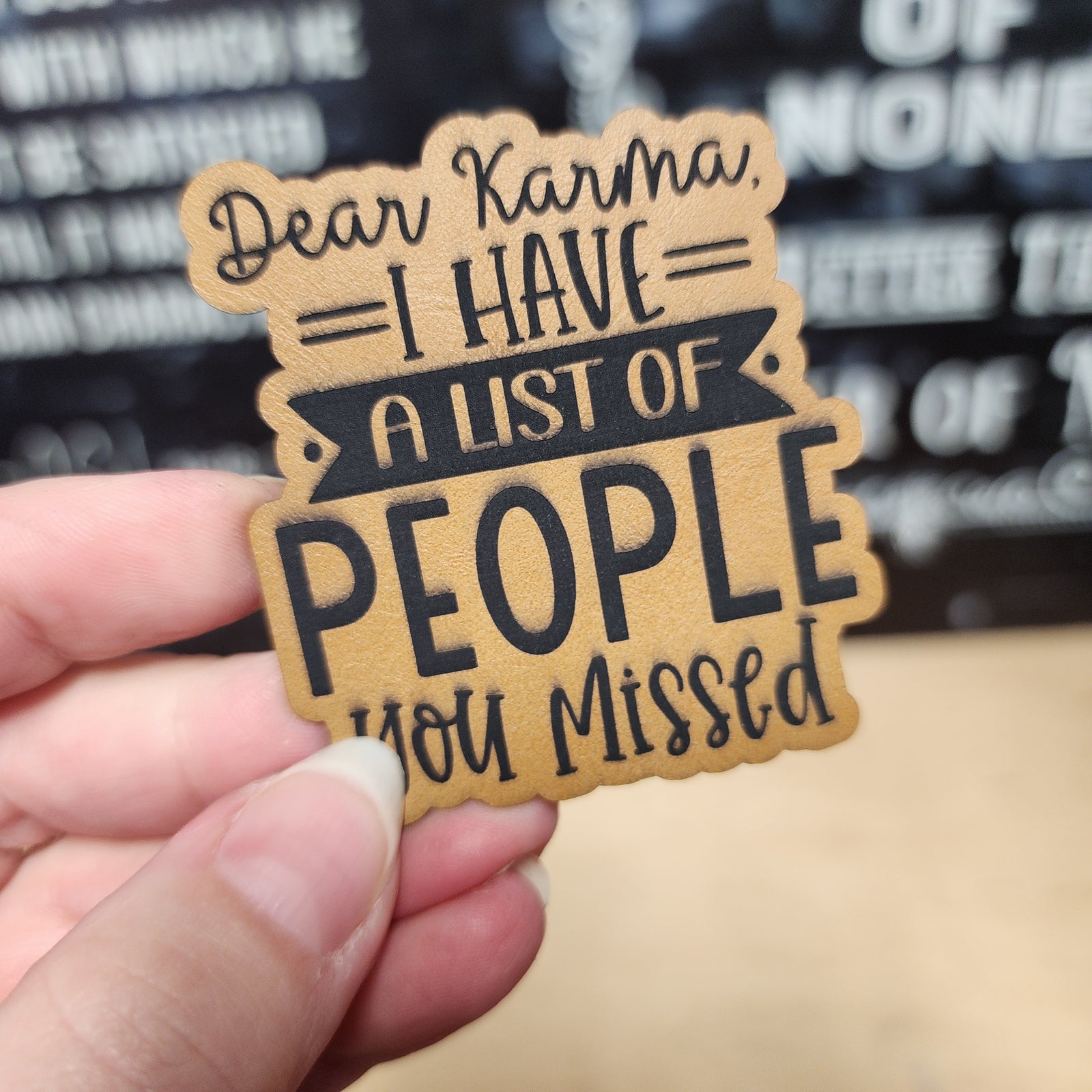 Dear Karma leatherette hat patch with a humorous message for unique gifts and accessories lovers.