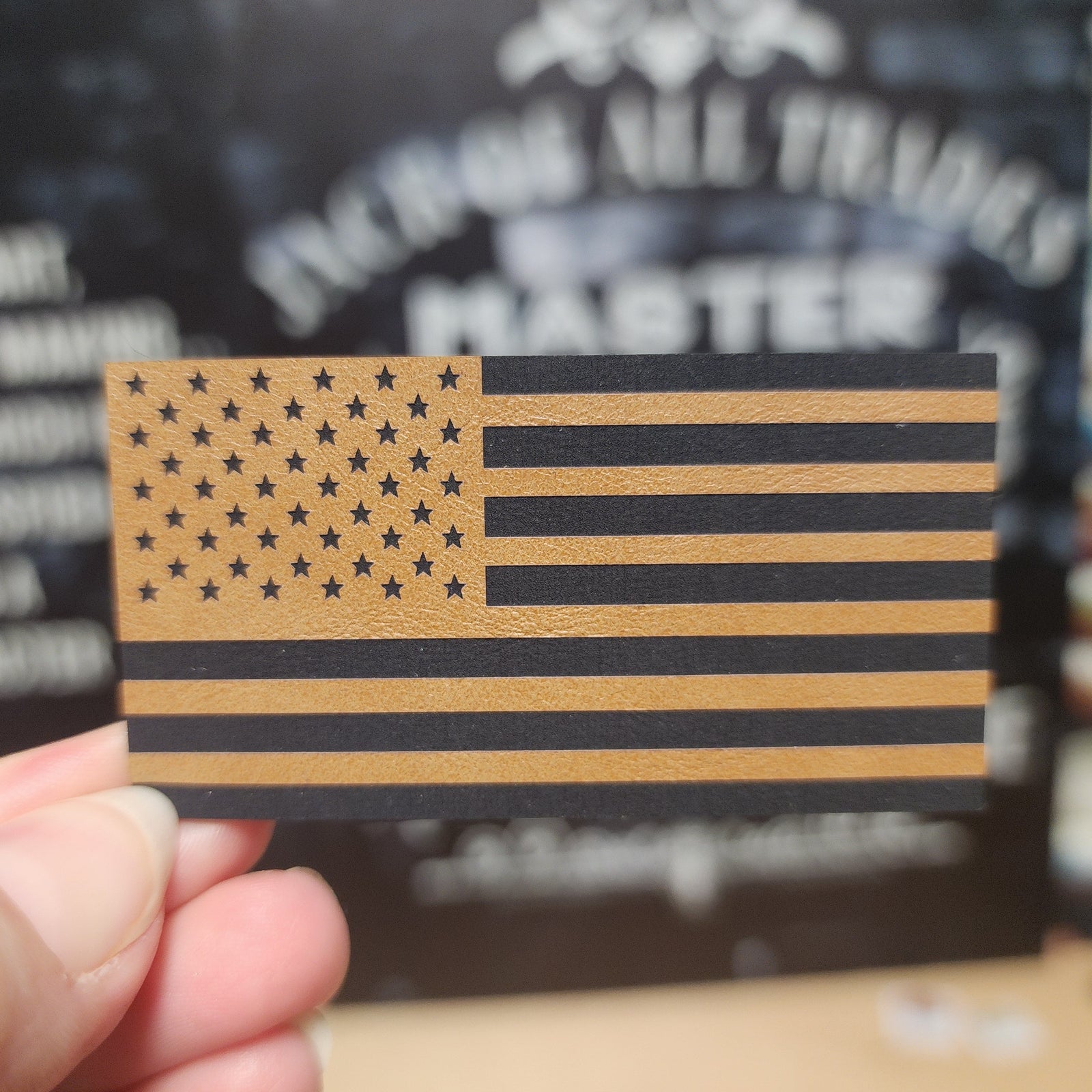 Leatherette American flag patch, stitched USA flag design, perfect for hats and apparel accessories.