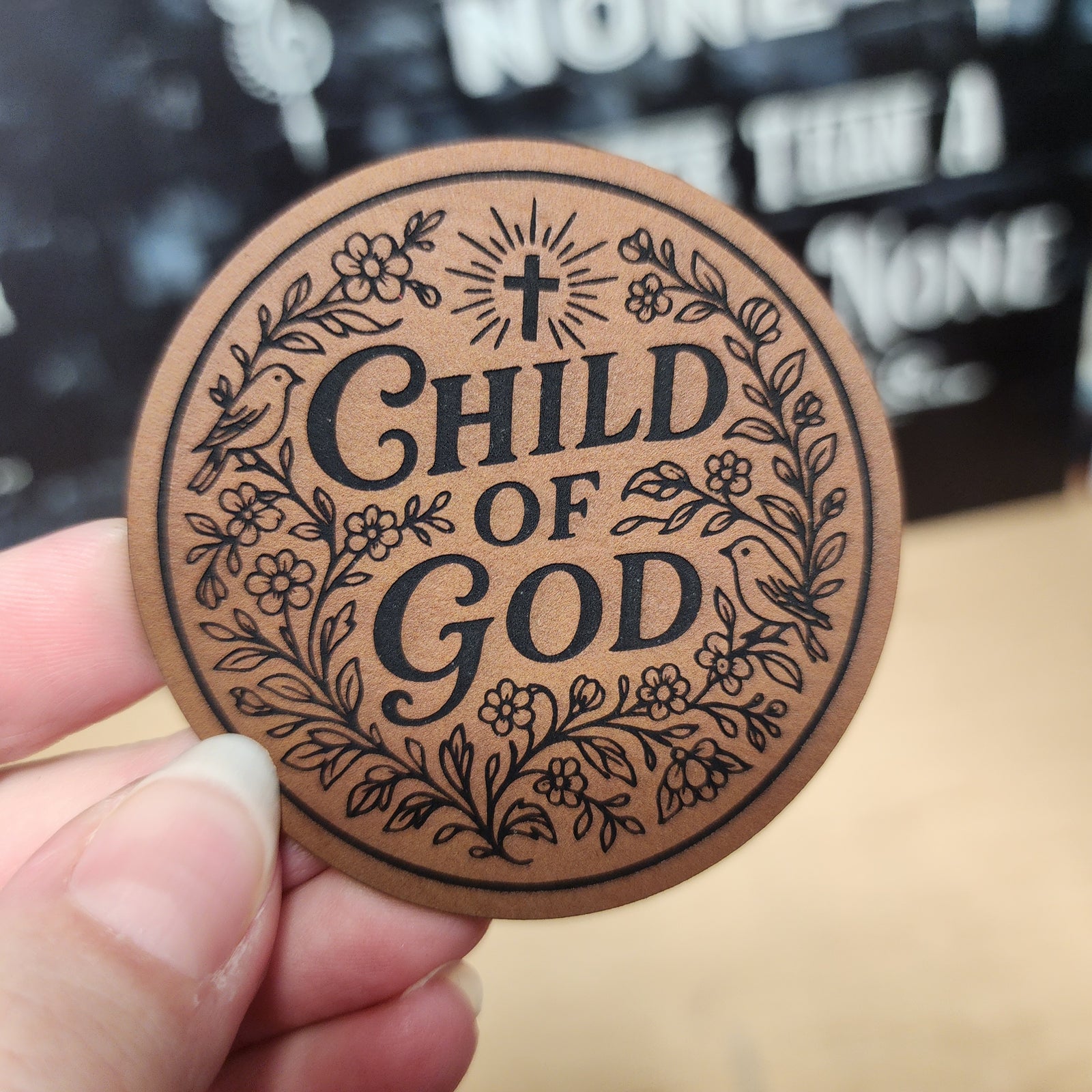 Child of God leatherette hat patch with floral design, perfect for hats or crafts celebrating faith.