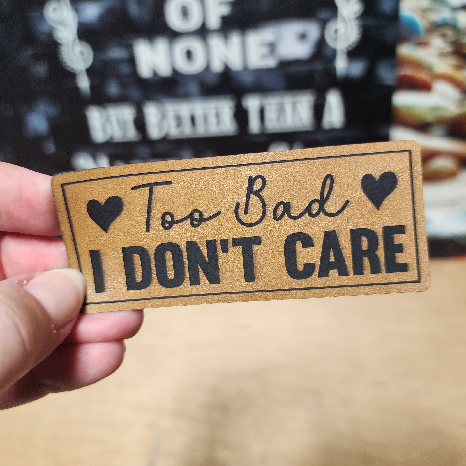 Too Bad I Don't Care leatherette hat patch for humor lovers, unique accessory for hats and bags.