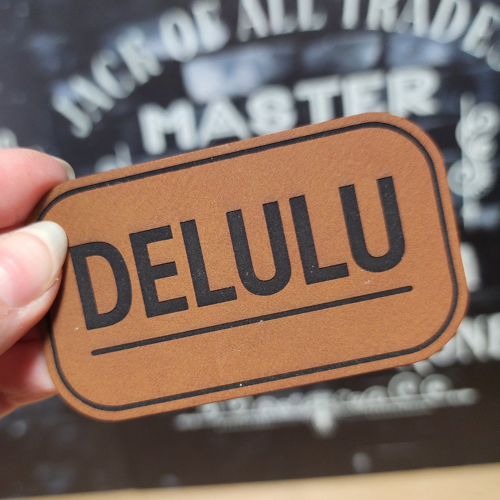 Delulu leatherette hat patch for hats, ideal for adding a unique touch to your cap collection.