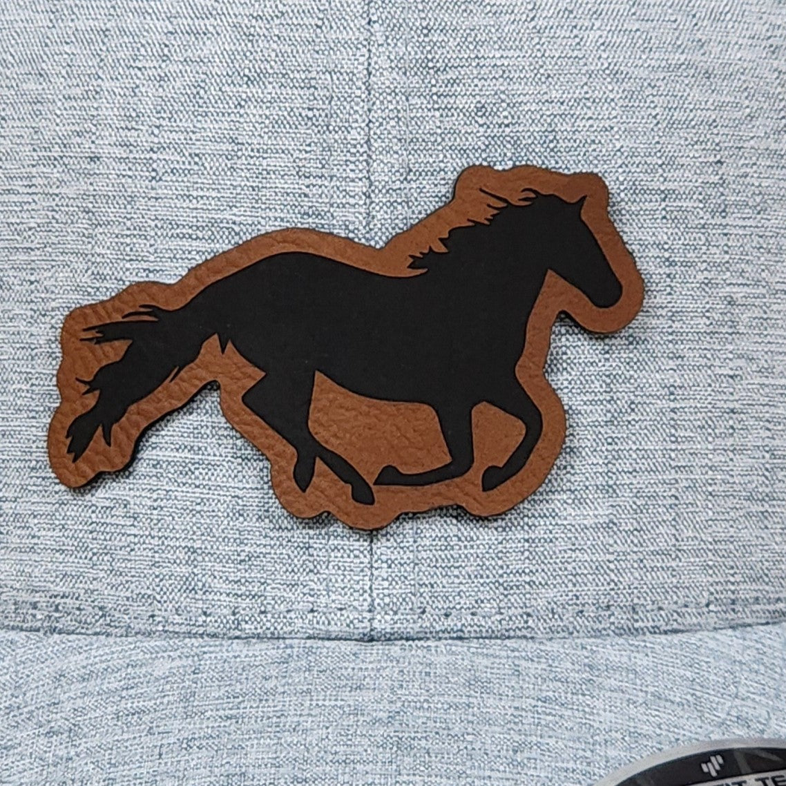 Horse leatherette hat patch for cowboy hats, rustic cap accessories perfect for rodeo enthusiasts and outdoor lovers.