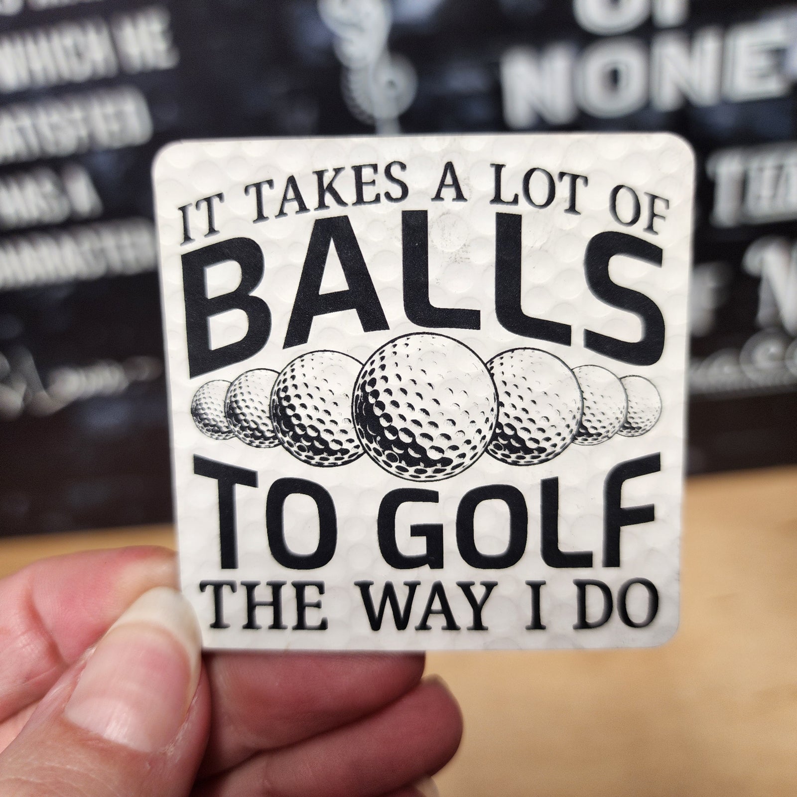 Funny golf leatherette hat patch that says 'It Takes a Lot of Balls to Golf the Way I Do' for golf lovers.