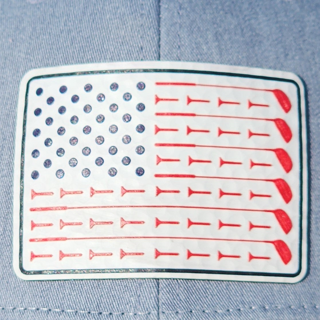 Patriotic golf hat patch featuring American flag design with golf tees, perfect for golf lovers and hat enthusiasts.