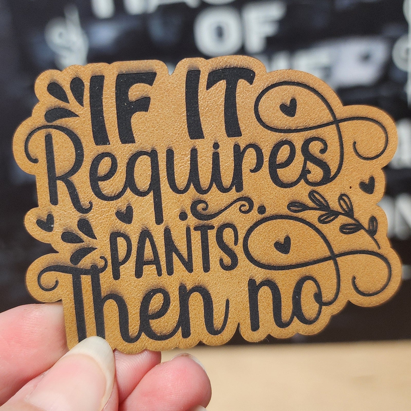 Funny leatherette hat patch saying 'If it requires pants then no' for casual and humorous accessories.