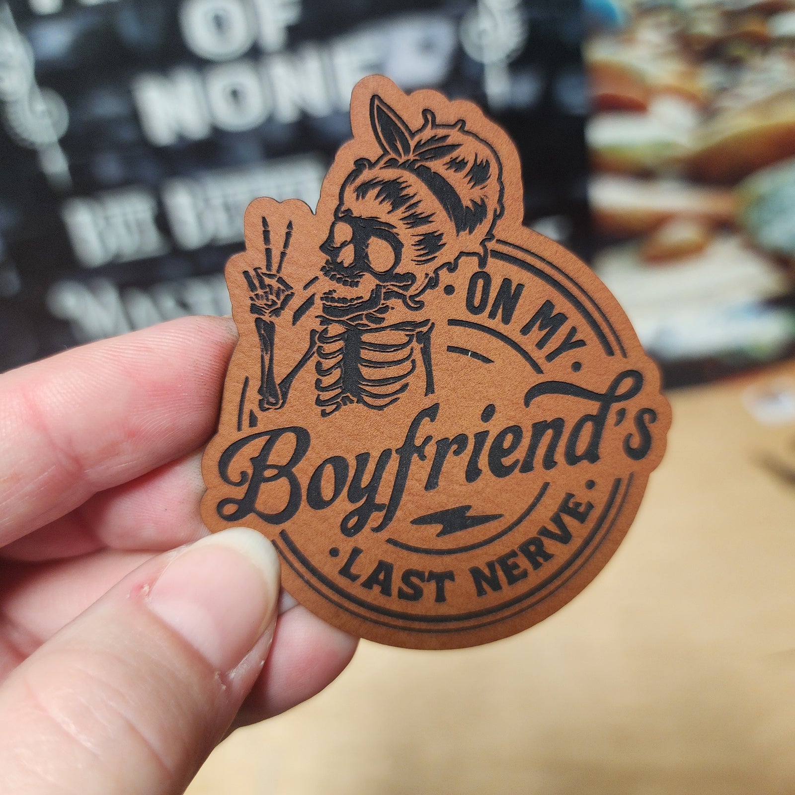 Boyfriend's Last Nerve leatherette hat patch featuring a playful skeleton design, perfect for quirky hats.