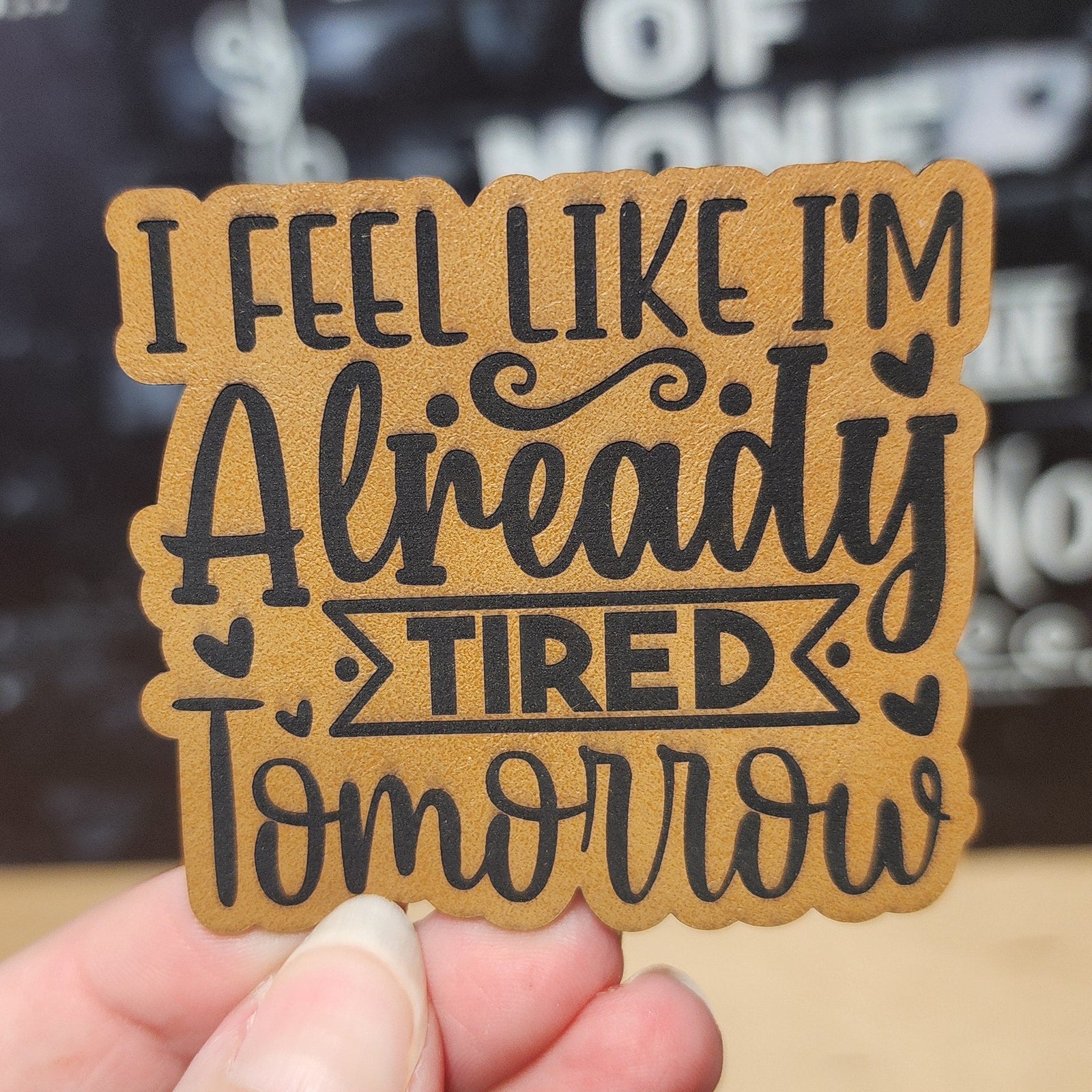 Funny leatherette hat patch saying 'I feel like I'm already tired tomorrow', perfect for casual wear.