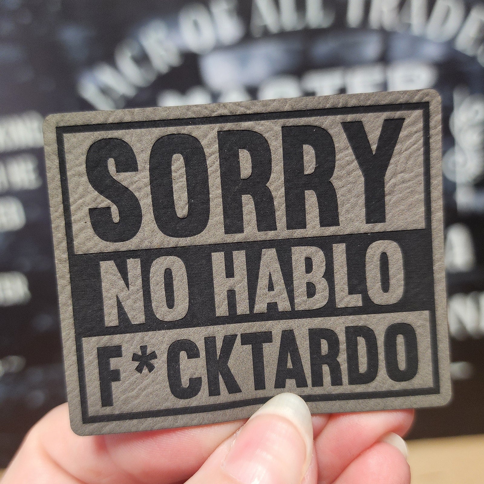 Funny leatherette hat patch saying 'Sorry No Hablo F*cktardo' perfect for humor-loving hat enthusiasts.