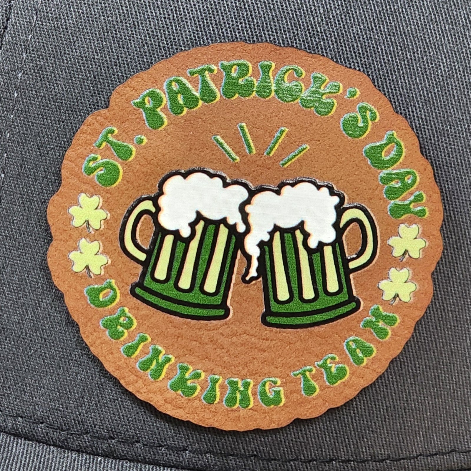St. Patrick's Day leatherette hat patch featuring beer mugs and festive drinking team design for celebration.