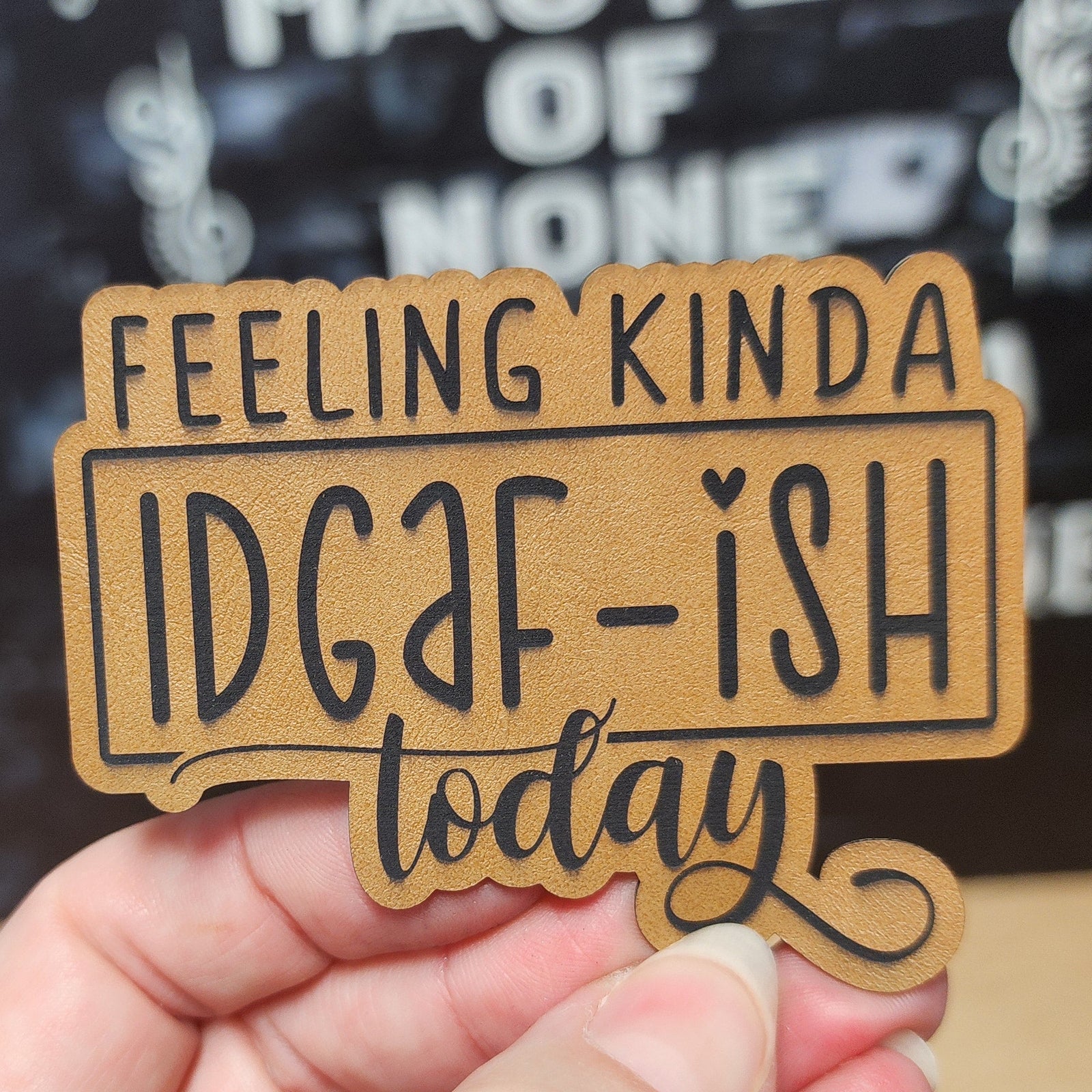 Leatherette hat patch with humorous 'Feeling Kinda IDGAF-ISH Today' design for casual wear and gift ideas.