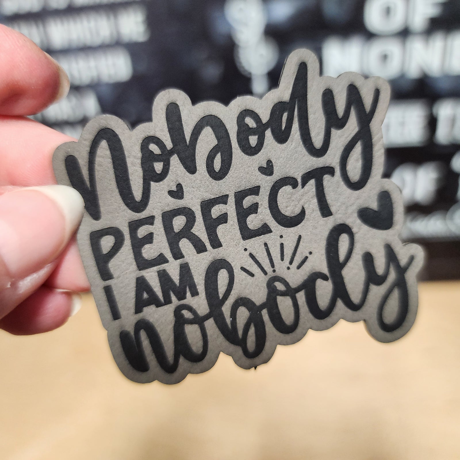 Nobody Perfect I Am Nobody leatherette hat patch, perfect for quirky accessories and fun style statements.