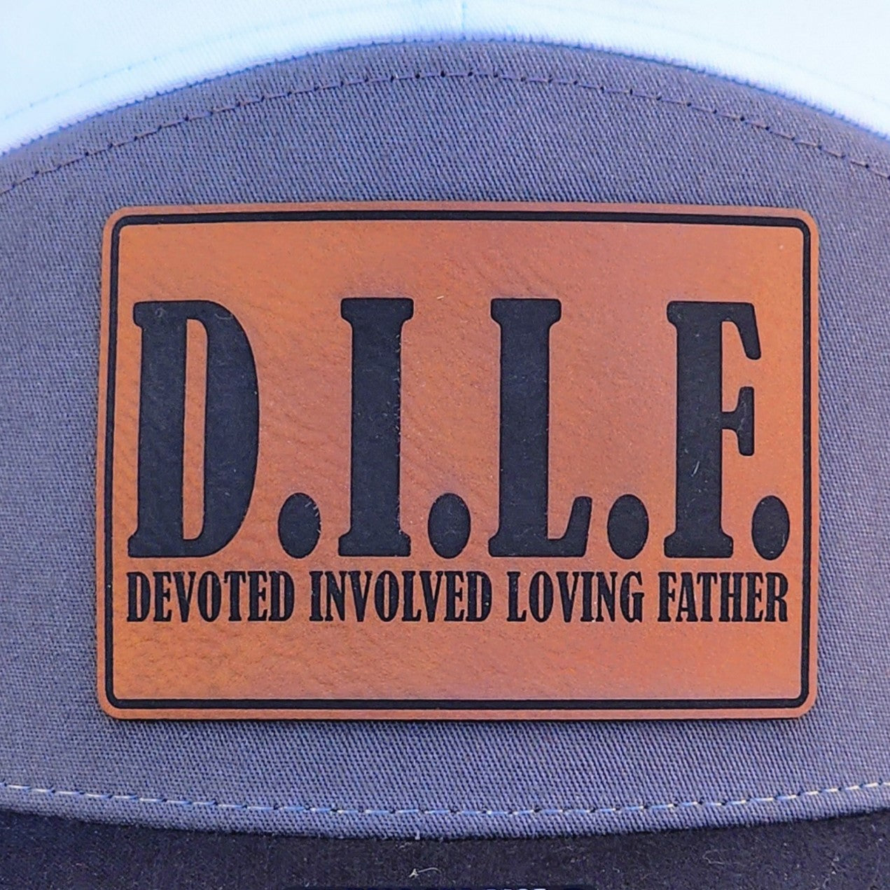 D.I.L.F. leatherette hat patch, Devoted Involved Loving Father cap adornment for proud dads and family occasions.