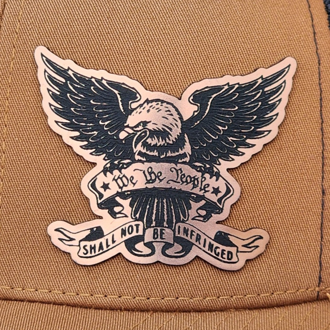 Patriotic leatherette hat patch featuring an eagle and 'We the People, Shall Not Be Infringed' design.