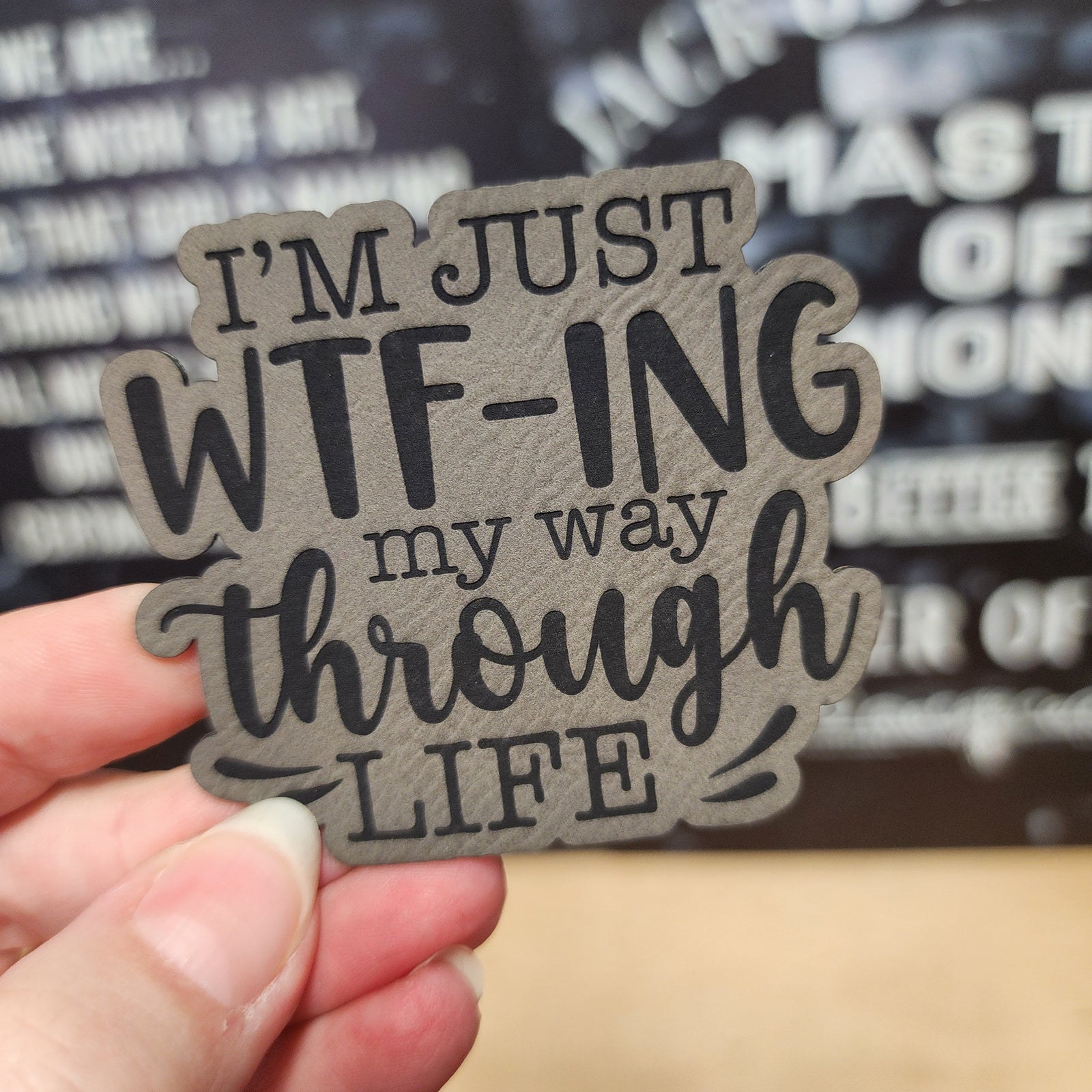 WTF-ing my way through life leatherette hat patch for humorous accessories and unique gifts.