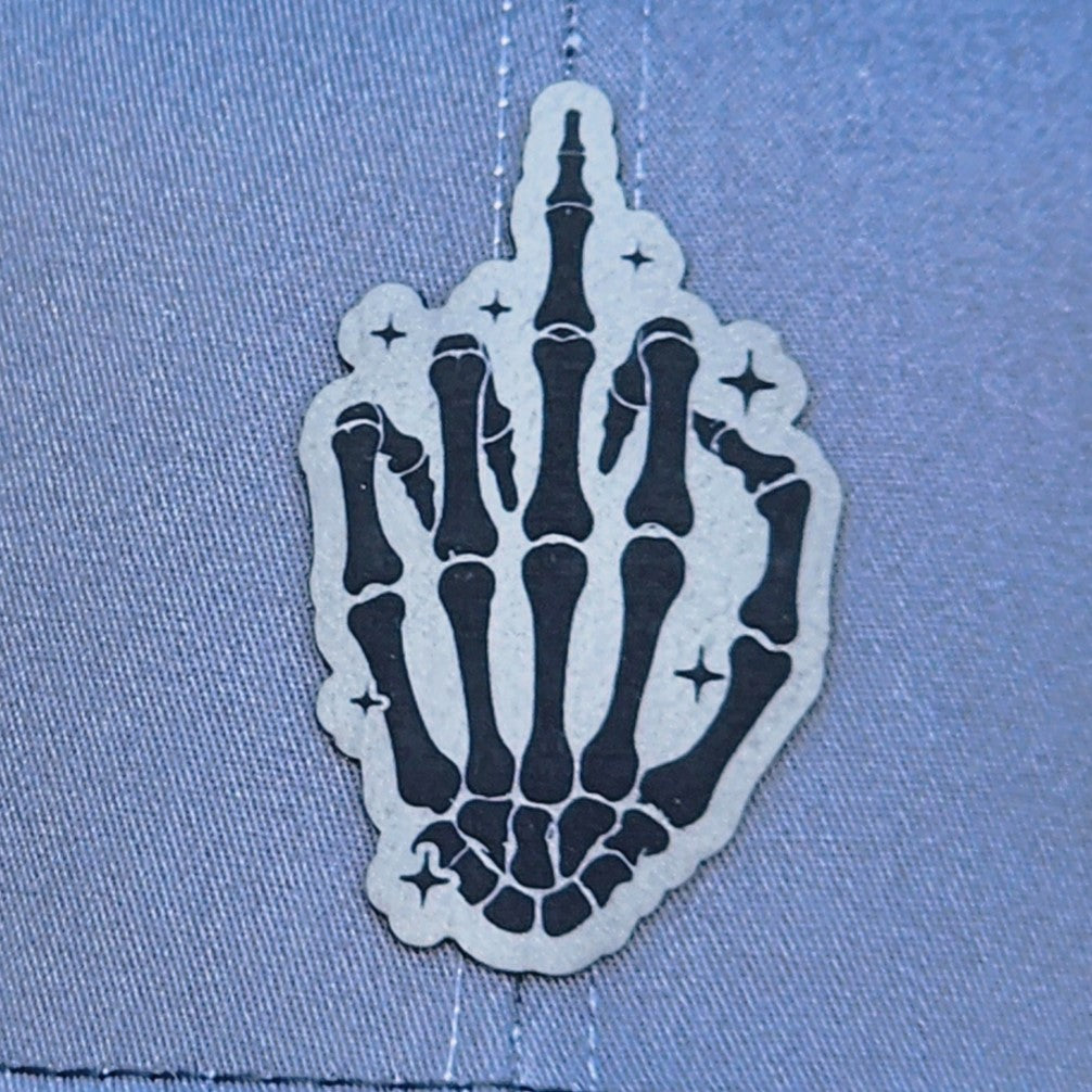 Skeleton hand leatherette hat patch for edgy style and unique fashion accessories.