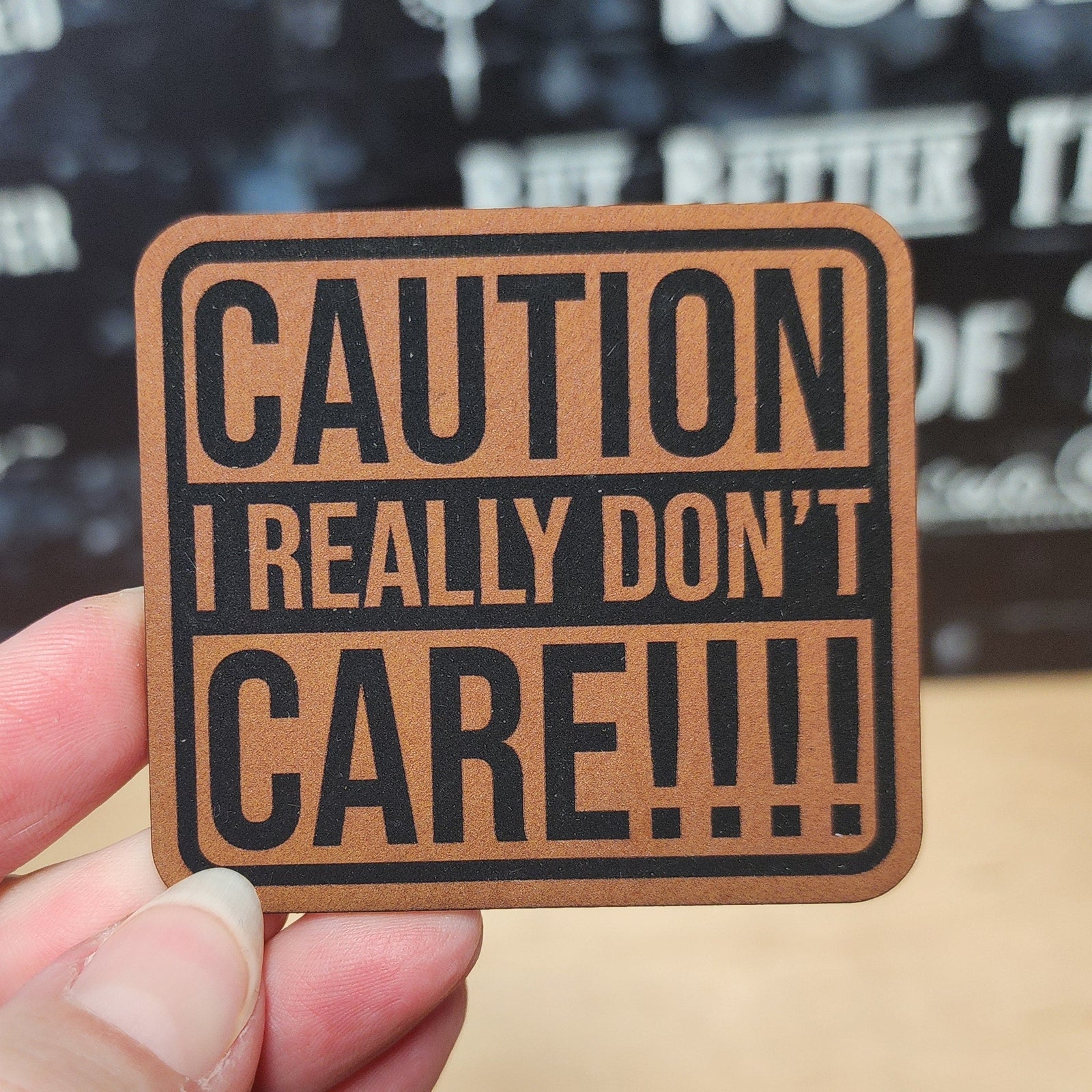 Caution I Really Don't Care leatherette hat patch, funny statement patch for hats and accessories.