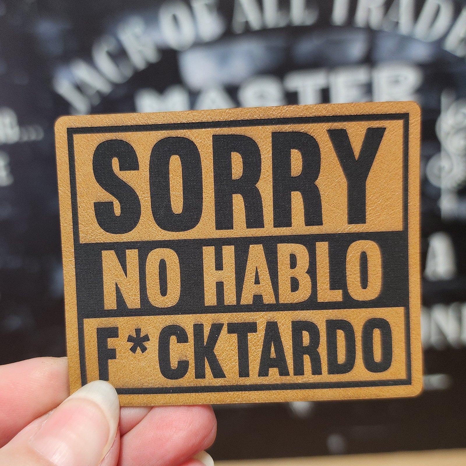 Leatherette funny hat patch saying 'Sorry No Hablo F*cktardo', perfect for casual hats and unique accessories.