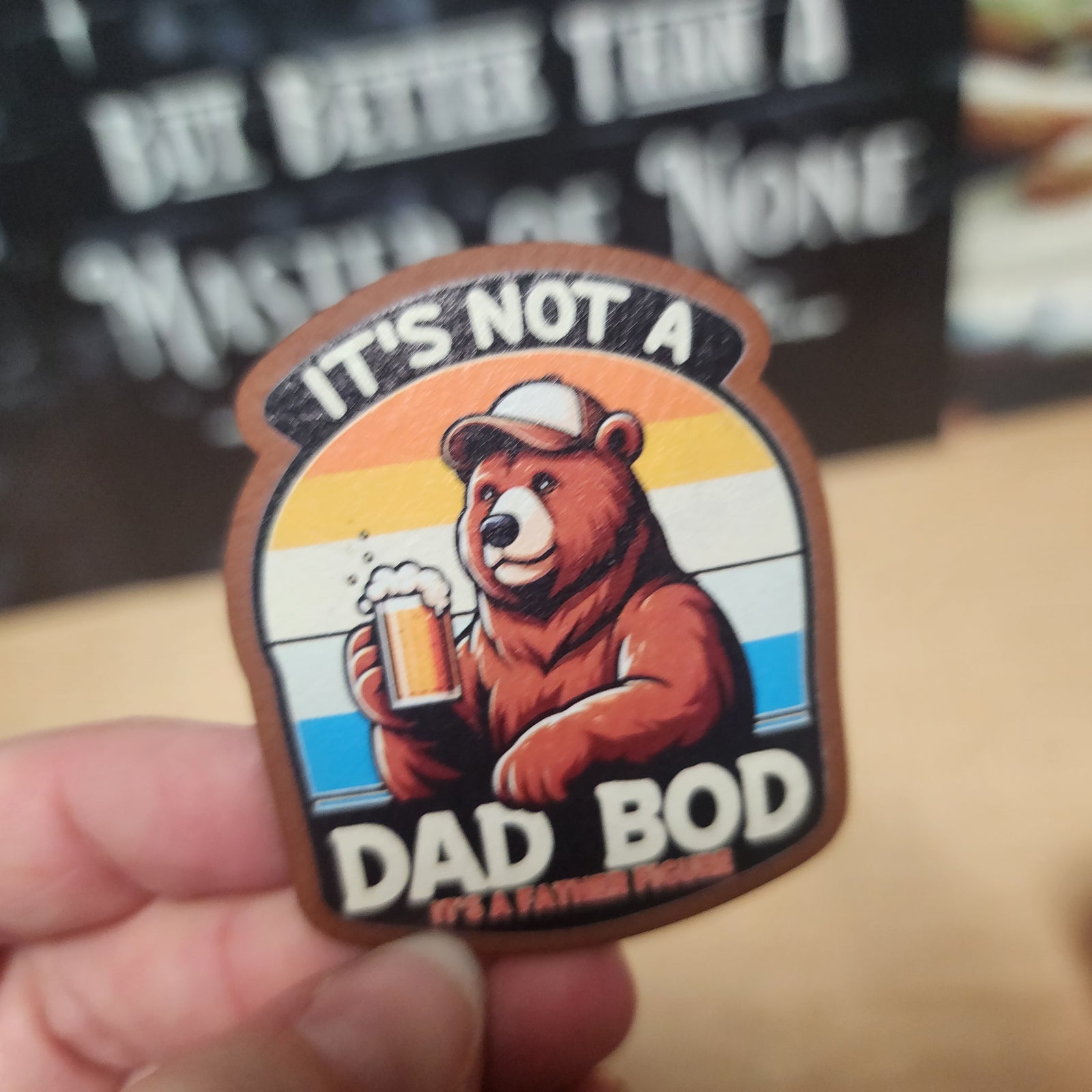 Dad Bod leatherette hat patch featuring a bear holding a beer, perfect for Father's Day gifts and dad humor.