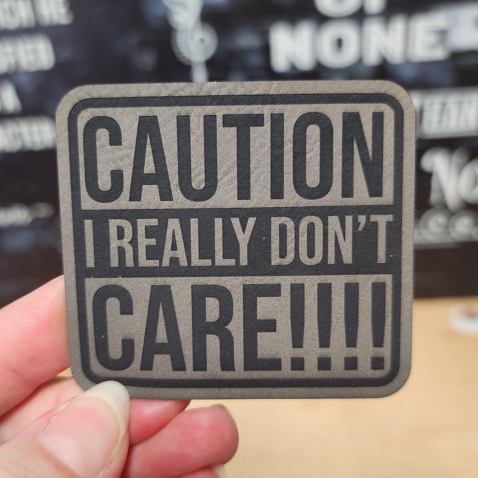 Caution I Really Don't Care leatherette hat patch for edgy style and bold statements on caps and jackets.