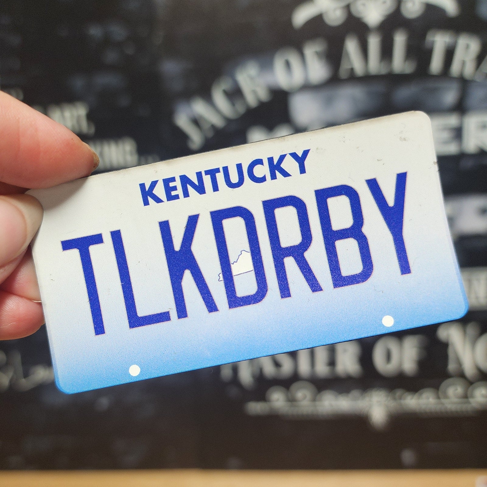 Kentucky license plate leatherette hat patch, unique accessory for stylish headwear enthusiasts and collectors.