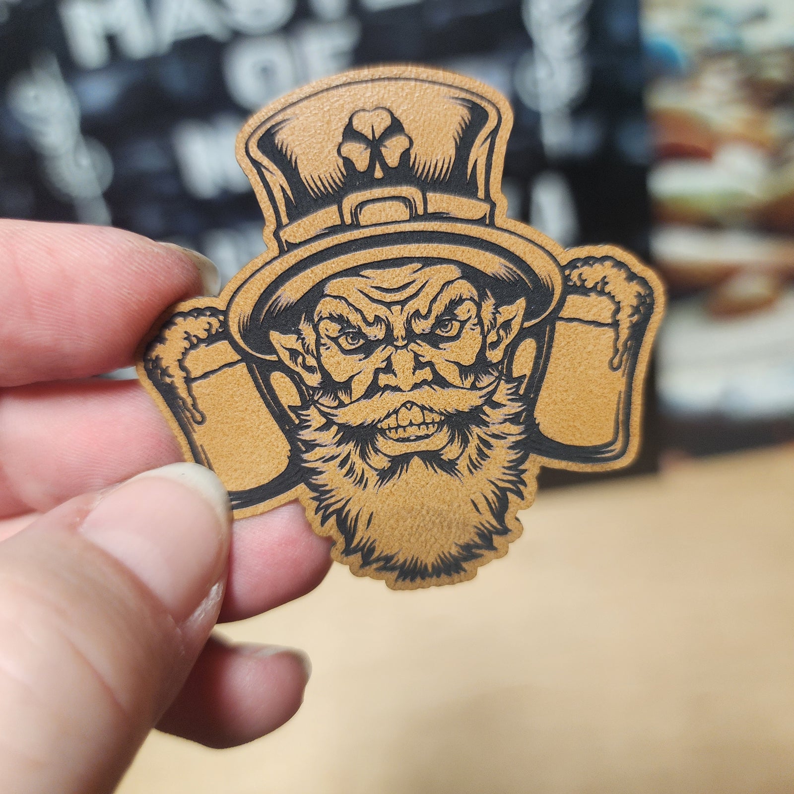 St. Patrick’s Day leatherette hat patch featuring a rugged leprechaun with a beer, perfect for festive hats.