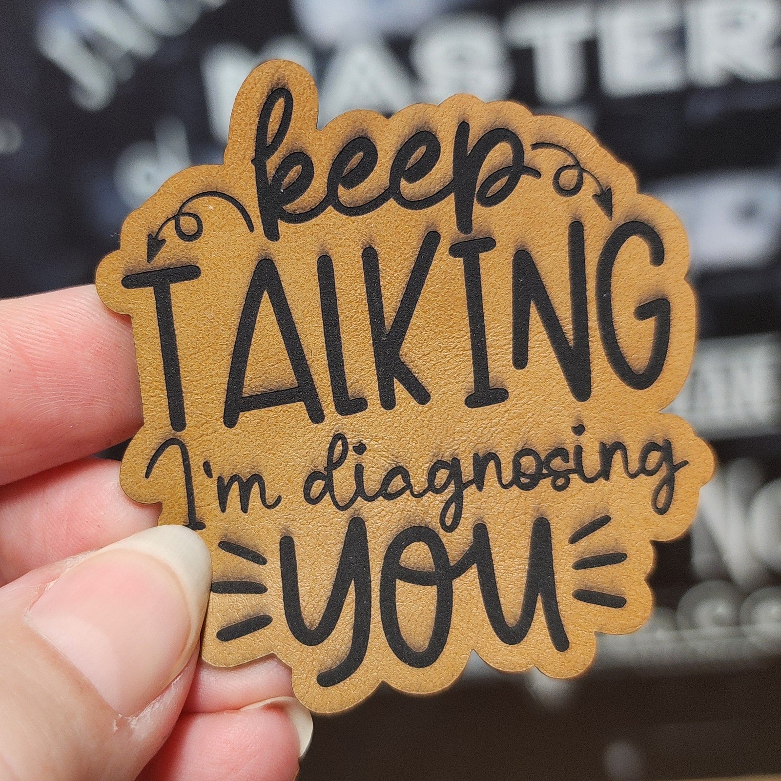Keep Talking leatherette hat patch with fun phrase for quirky hats, unique gifts, and humorous accessories.