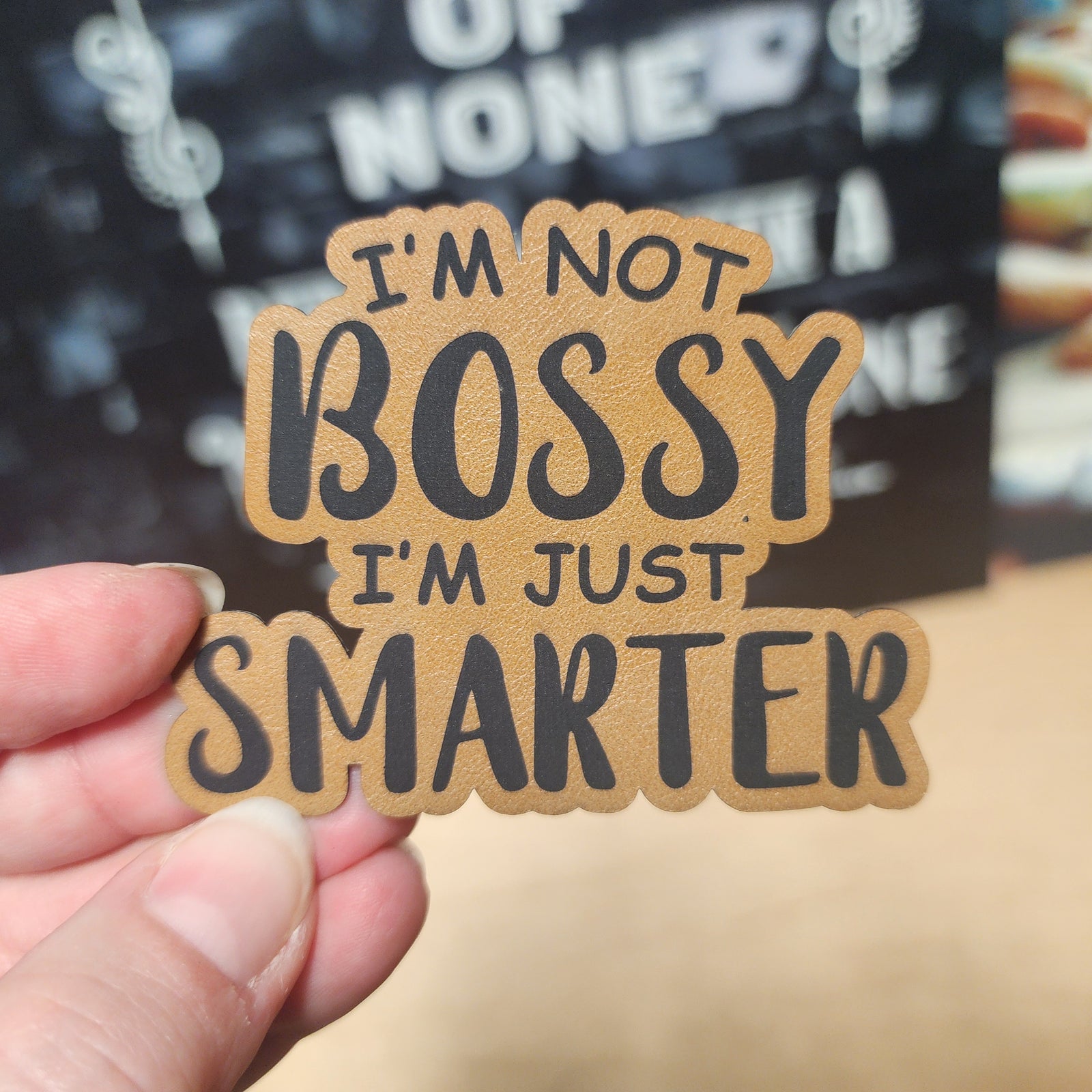 Funny leatherette hat patch saying 'I'm Not Bossy, I'm Just Smarter' for quirky accessories and gifting.