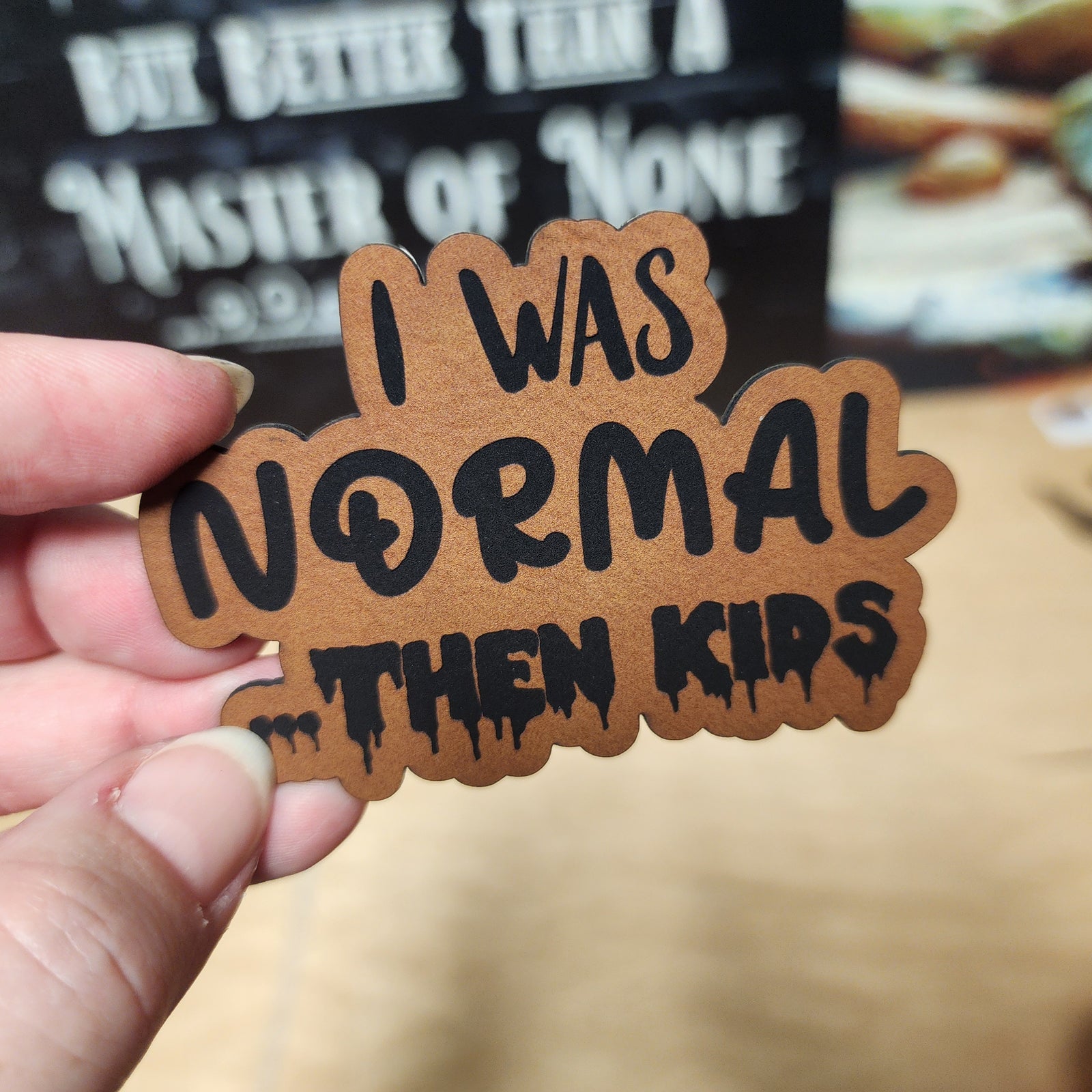 Funny leatherette hat patch saying 'I was normal...then kids' for stylish parenting accessories.