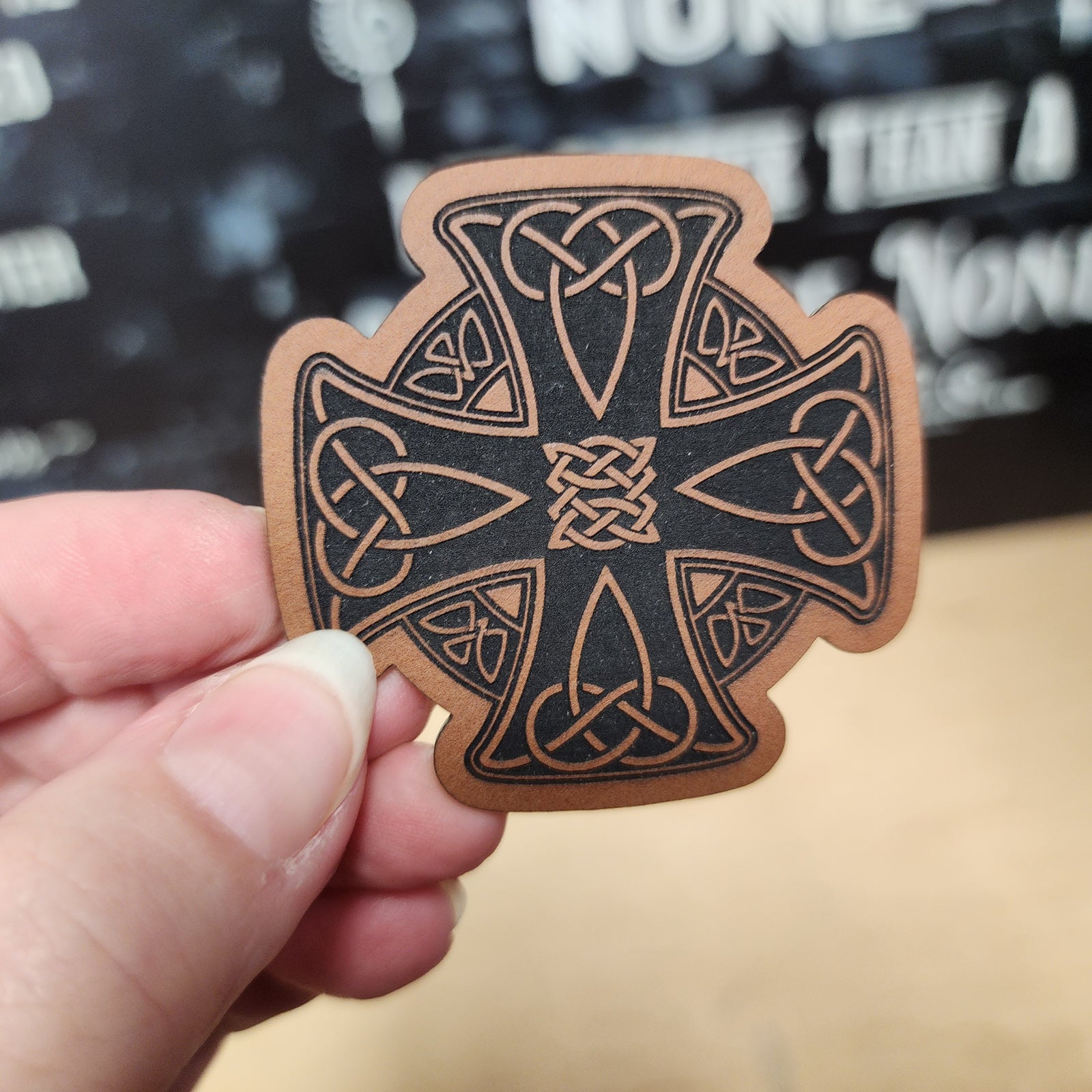 Celtic leatherette hat patch featuring intricate knot design, perfect for hats, backpacks, or jackets.