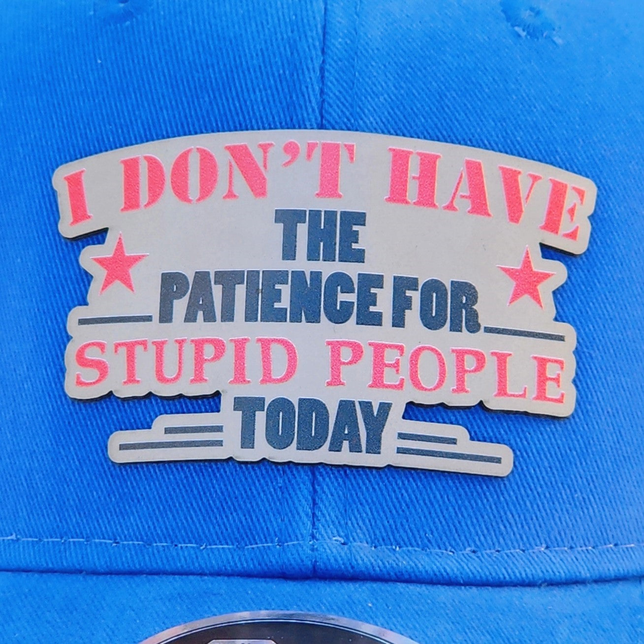 Humorous leatherette hat patch with bold text: 'I DON'T HAVE THE PATIENCE FOR STUPID PEOPLE TODAY', ideal for casual wear.