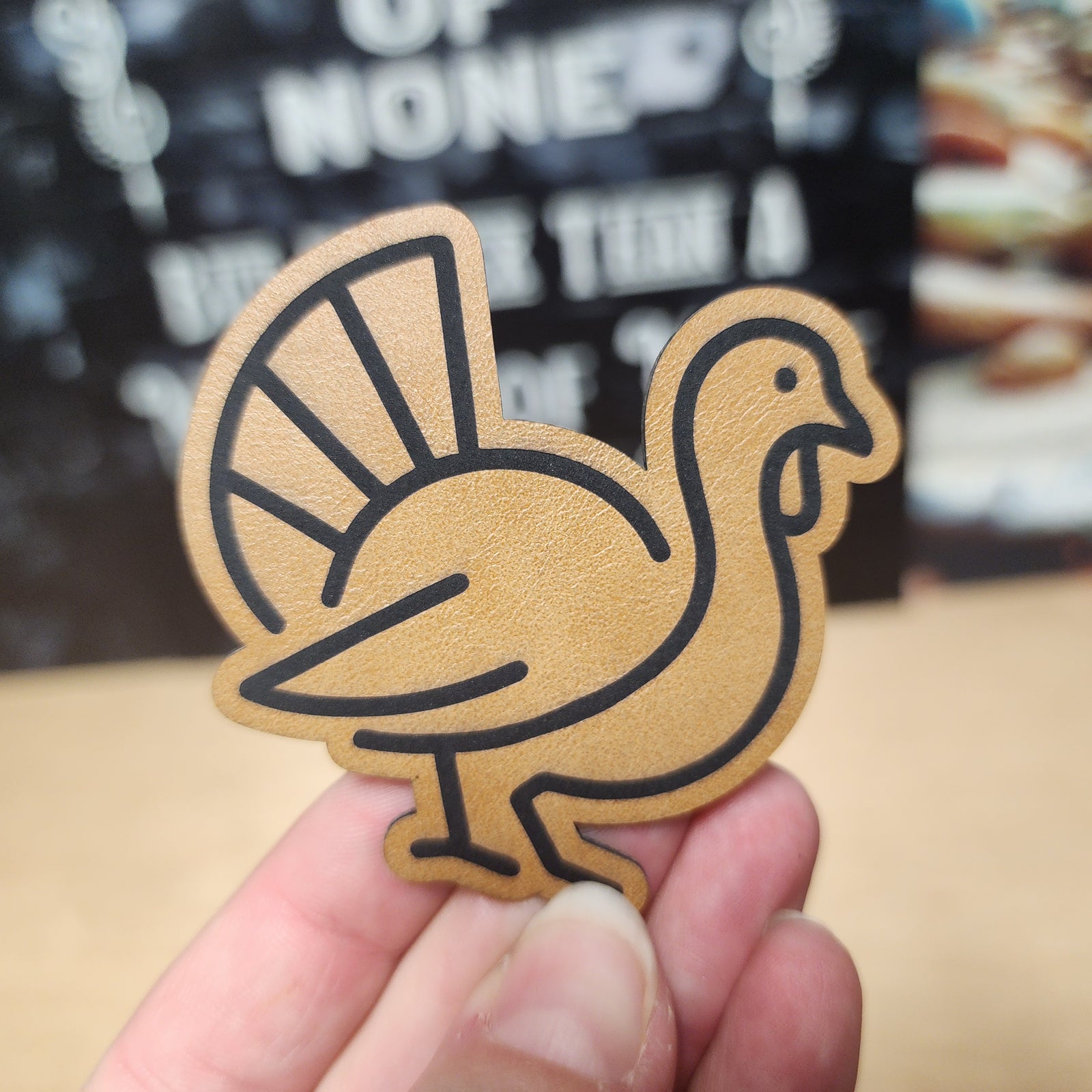 Thanksgiving leatherette turkey hat patch for festive holiday apparel and accessories.
