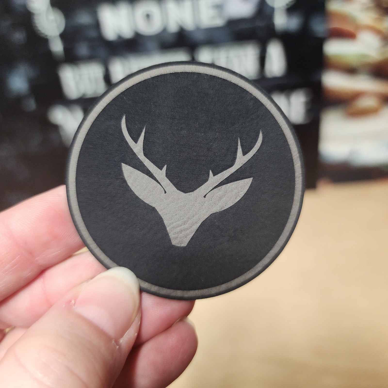 Stylish leatherette hat patch featuring a deer silhouette, perfect for outdoor and hunting enthusiasts.