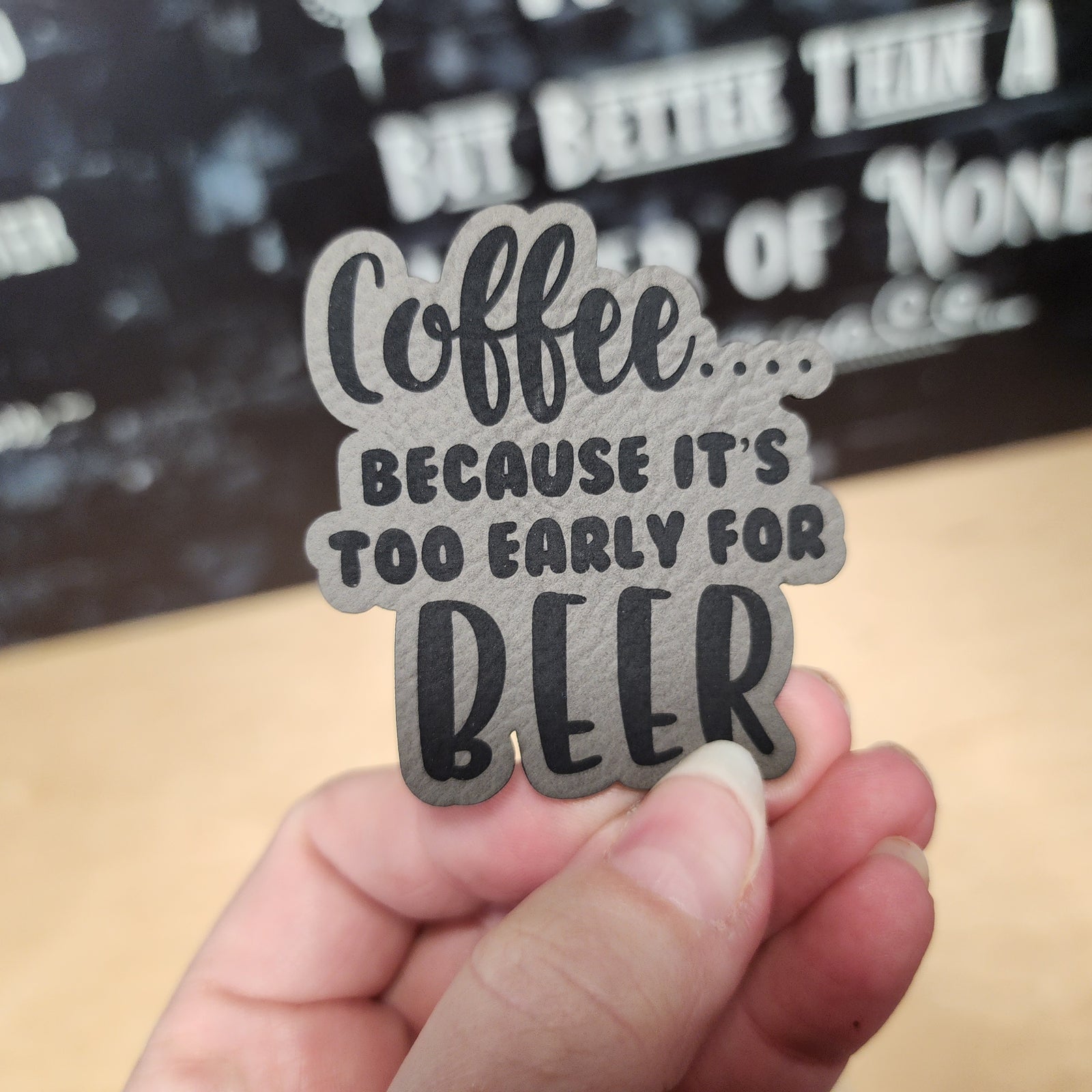 Coffee leatherette hat patch with funny saying ‘Coffee... because it's too early for beer’ for coffee lovers and humor.