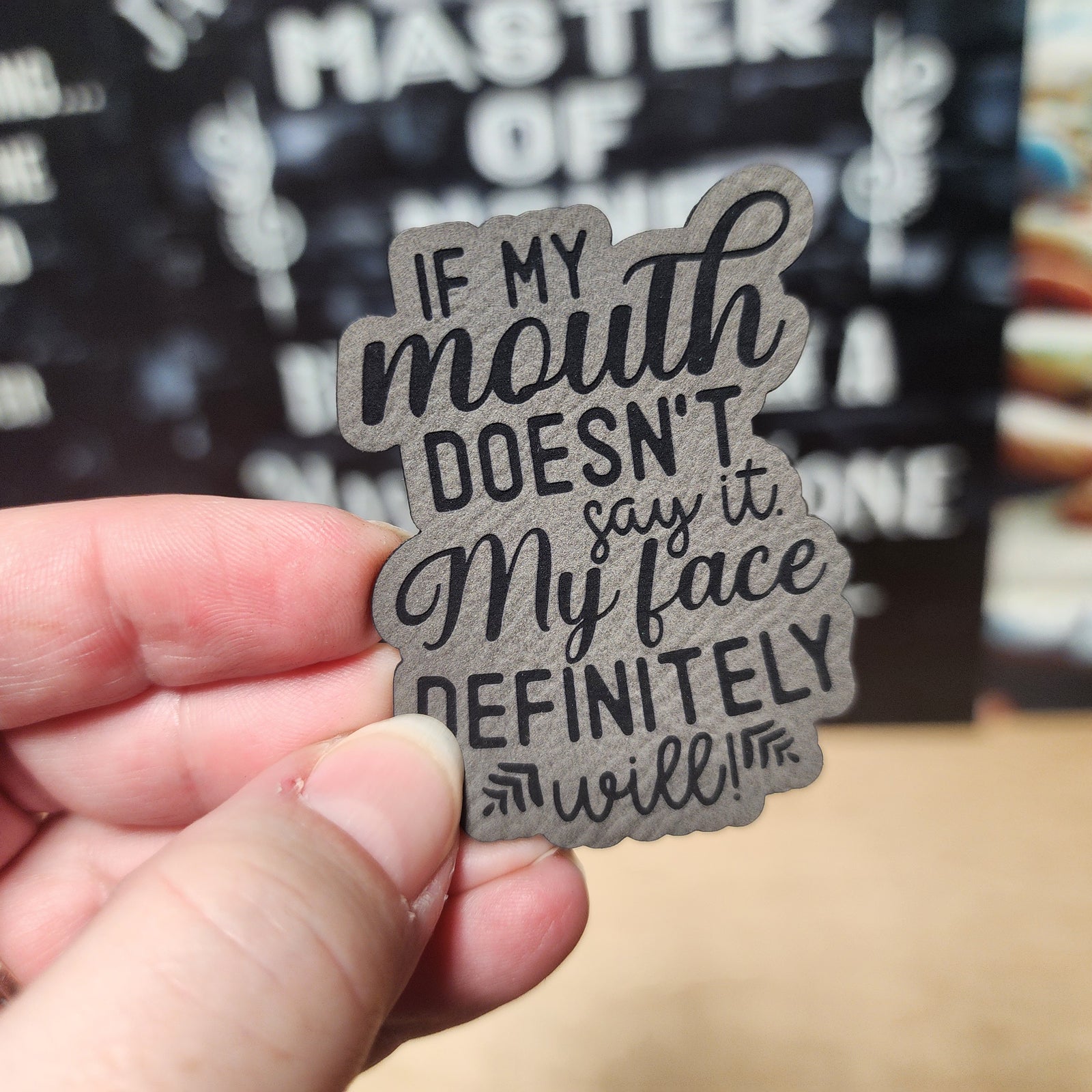 Funny leatherette hat patch, "If my mouth doesn’t say it, my face definitely will!" perfect for quirky gifts.