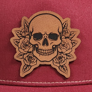 Skull and roses leatherette hat patch for edgy fashion lovers and gothic style enthusiasts.