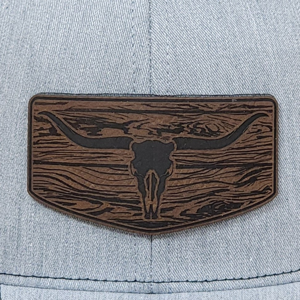 Western leatherette hat patch with longhorn skull design, perfect for cowboy hats or rustic style apparel.
