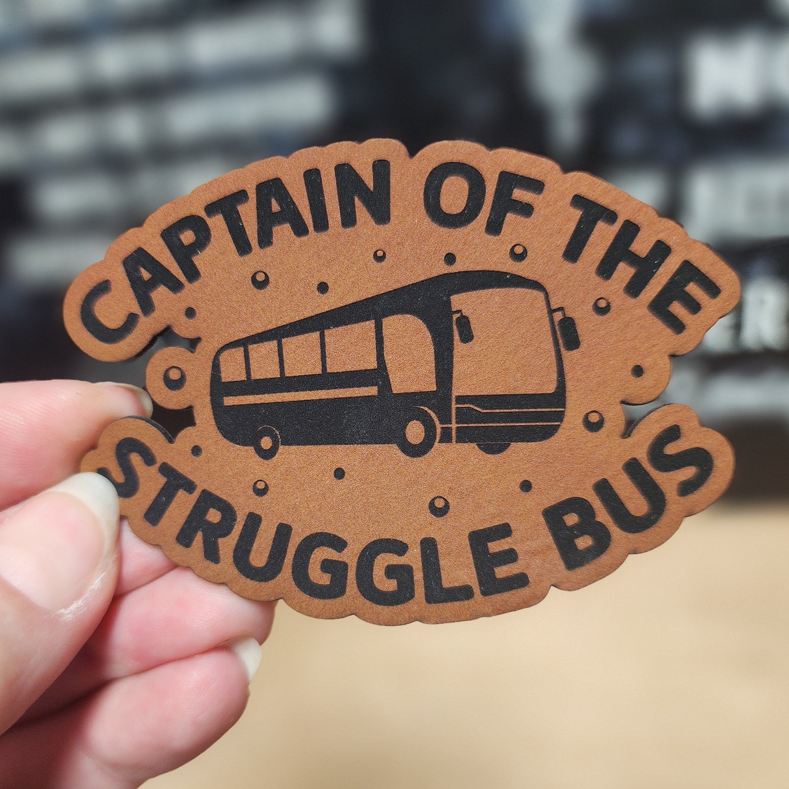 Captain of the Struggle Bus leatherette hat patch, unique bus-themed accessory for quirky fashion enthusiasts.