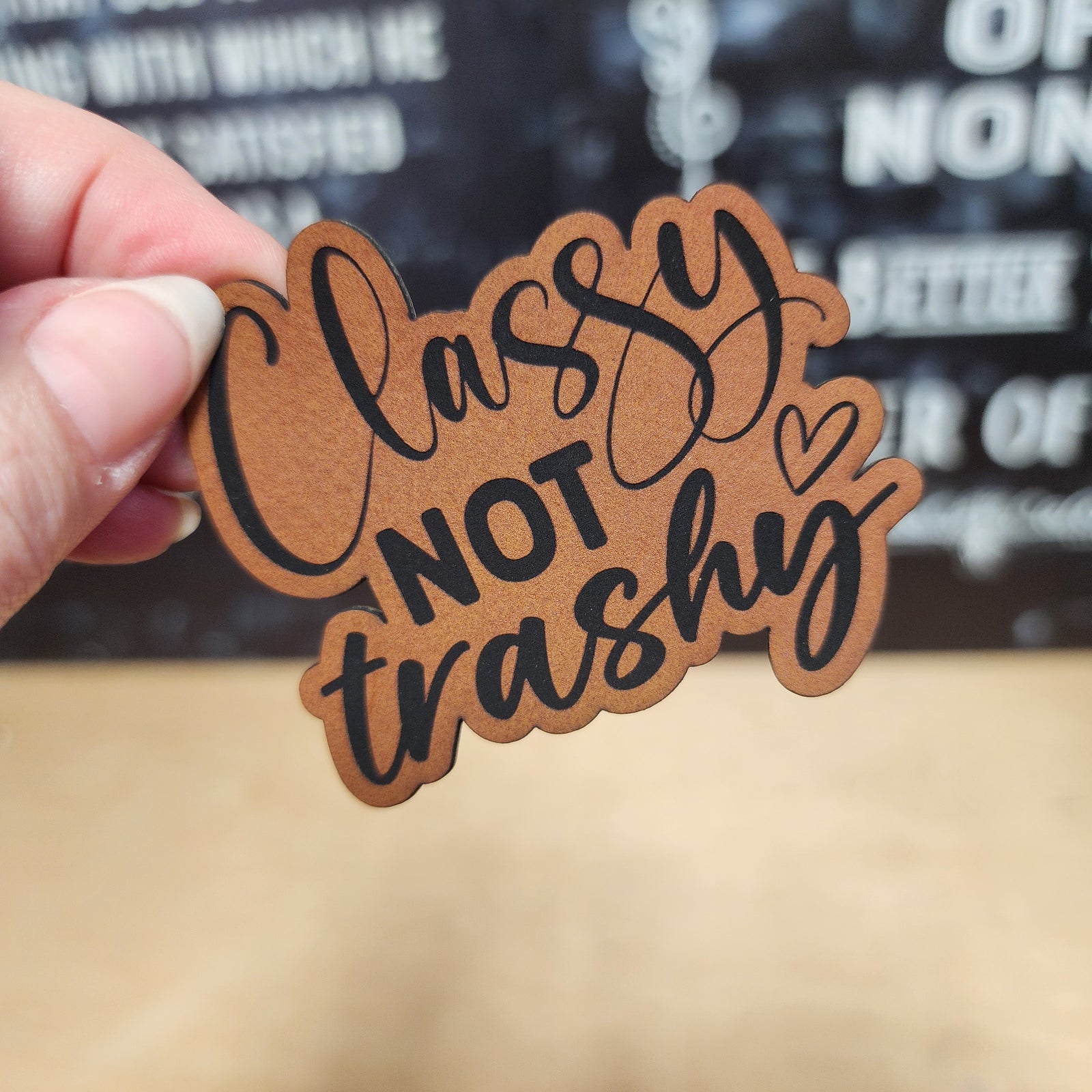 Classy Not Trashy leatherette hat patch, perfect for stylish accessories and trendy headwear.