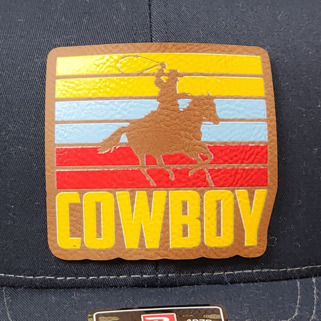 Cowboy hat patch with vintage rodeo design, perfect for western wear enthusiasts and rodeo fans.