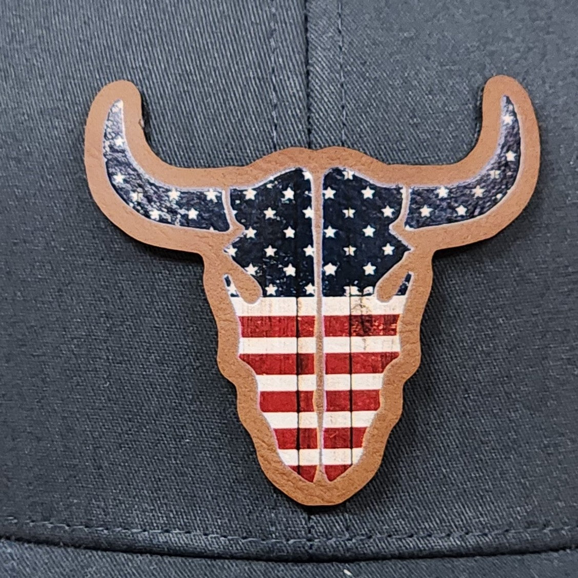 Texas Longhorn leatherette hat patch with American flag design perfect for western style cap lovers.