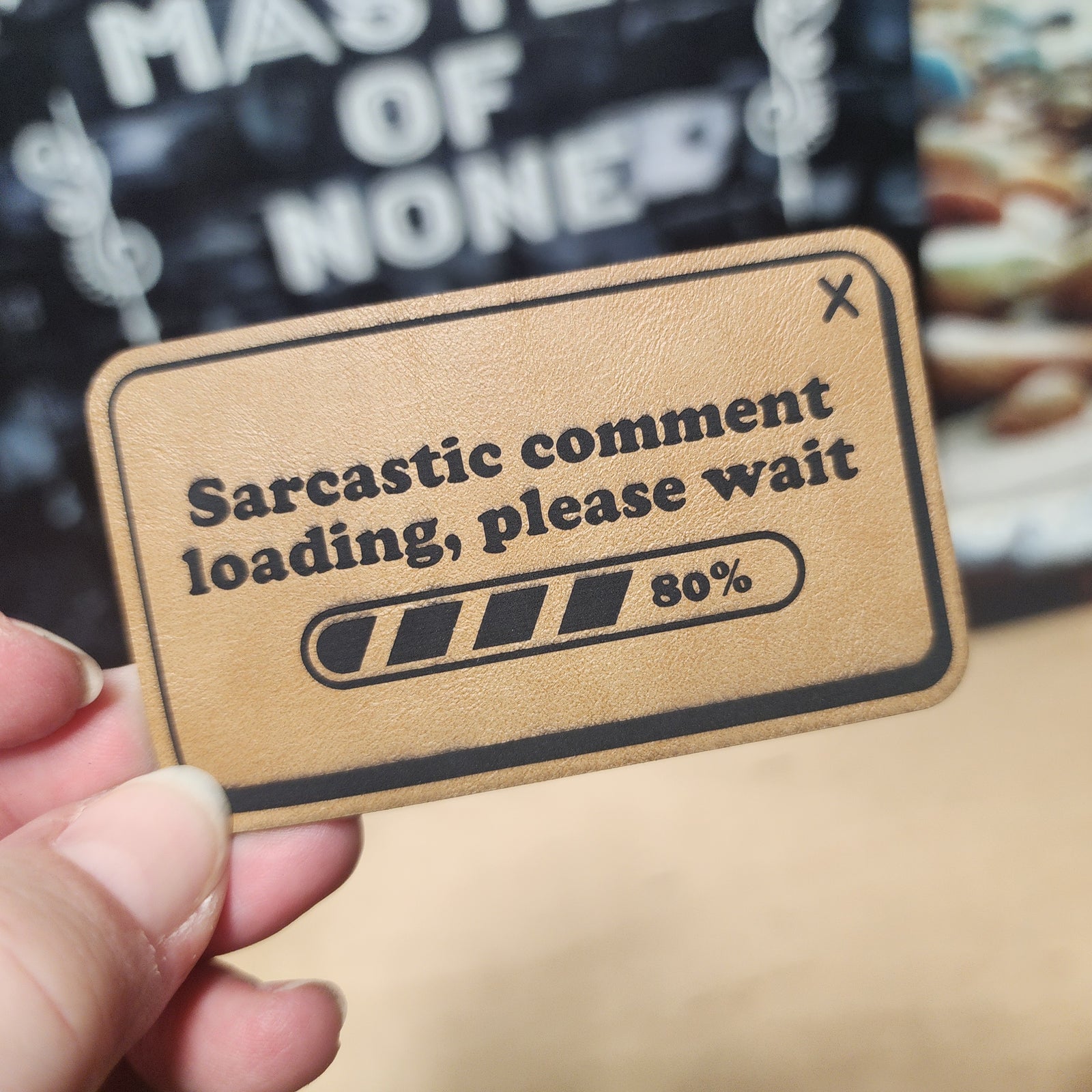 Sarcastic comment loading leatherette hat patch for witty hat lovers and humor enthusiasts.