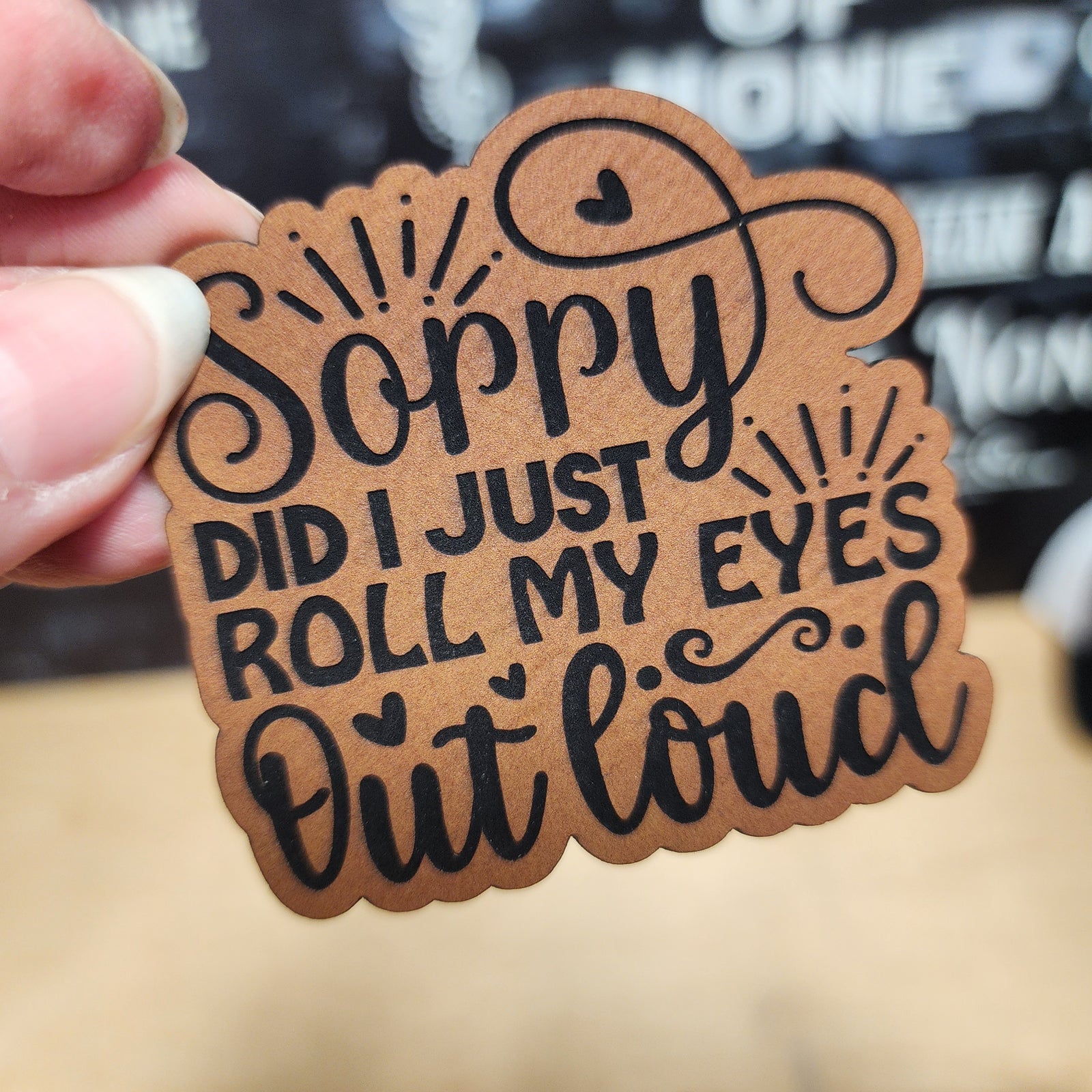 Funny leatherette hat patch saying 'Sorry Did I Just Roll My Eyes Out Loud' for humorous gifts and accessories.
