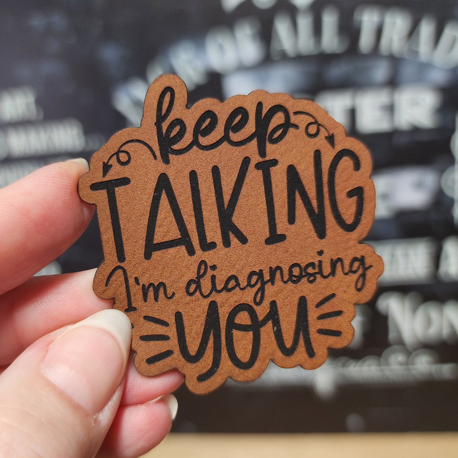 Funny leatherette hat patch with 'Keep Talking I'm Diagnosing You' quote for unique hats and gifts.